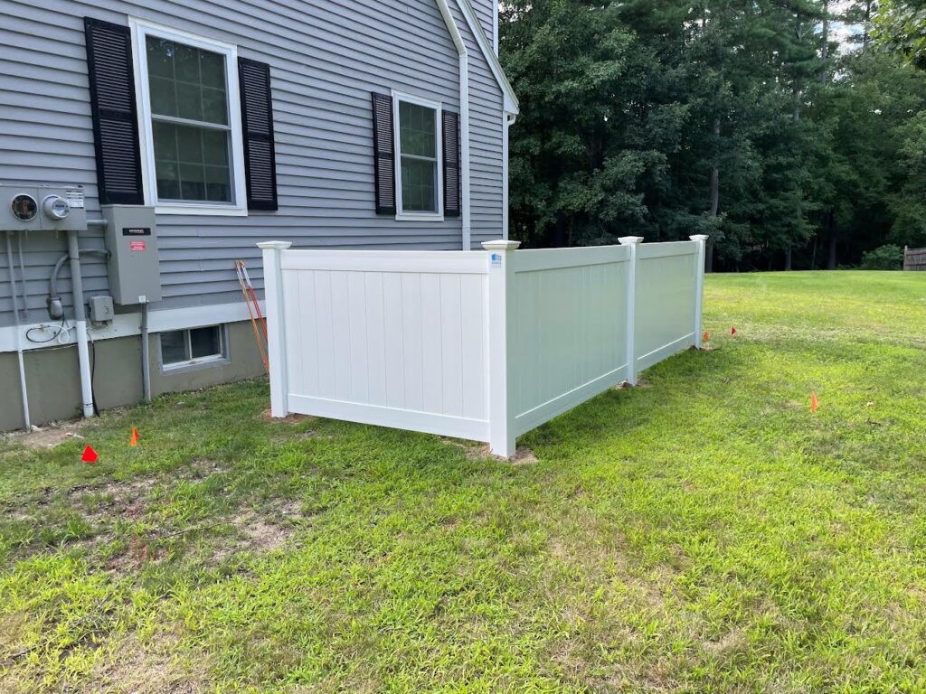 For this Litchfield, NH property, our crew installed a 4' white vinyl privacy fence around the generator area, creating a clean screen while keeping the space accessible for service and maintenance. The bright white vinyl gives the area a crisp, finished appearance and blends nicely with the home without completely enclosing the yard