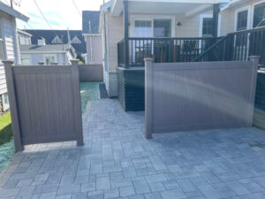 Granite State Fence installed Bufftech wood grained vinal fencing for this property in Wells, ME.