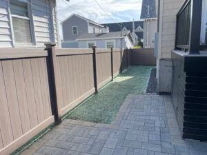 Granite State Fence installed Bufftech wood grained vinal fencing for this property in Wells, ME.