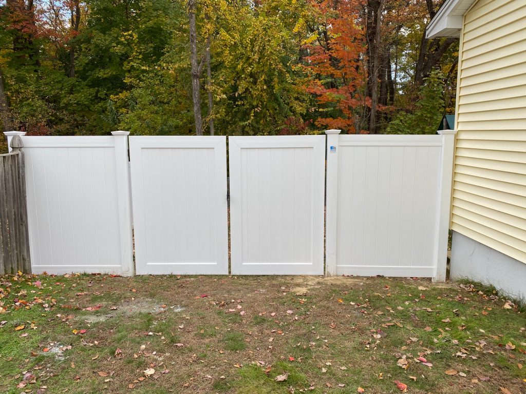 For this homeowner in Nashua, NH, we installed 6' tall white vinyl privacy fencing.