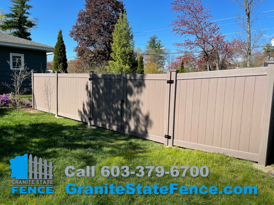 Wood Grain Vinyl Fencing installed in Manchester, NH.