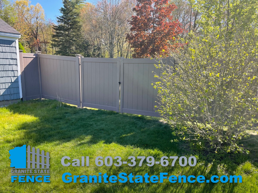 Wood Grain Vinyl Fencing installed in Manchester, NH.