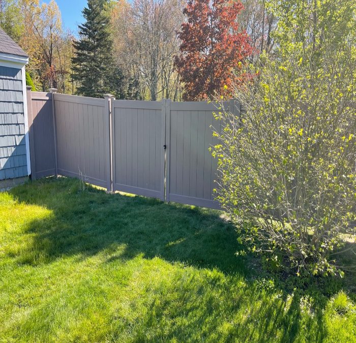 Wood Grain Vinyl Fencing installed in Manchester NH