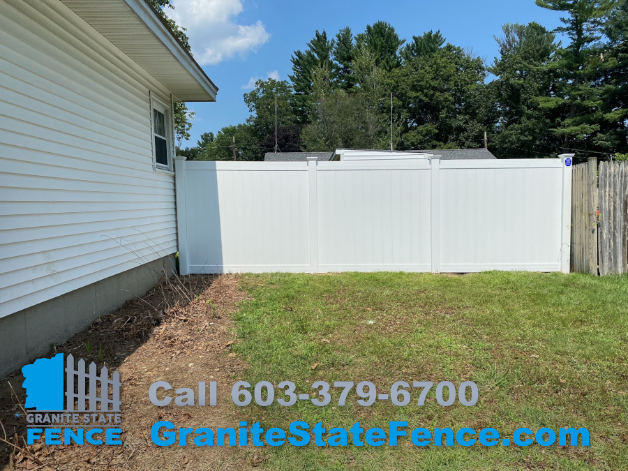 White Vinyl Privacy Fencing installation in Hudson, NH.