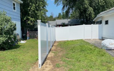 White Vinyl Privacy Fencing installation in Hudson, NH