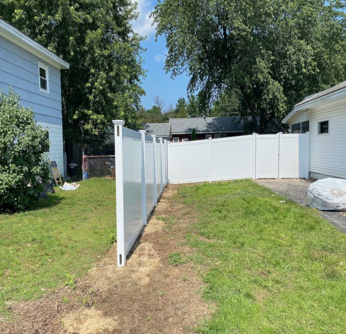 White Vinyl Privacy Fencing installation in Hudson, NH