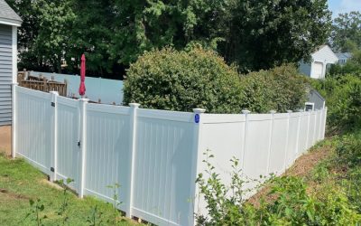 White Vinyl Privacy Fence installed in Nashua, NH.
