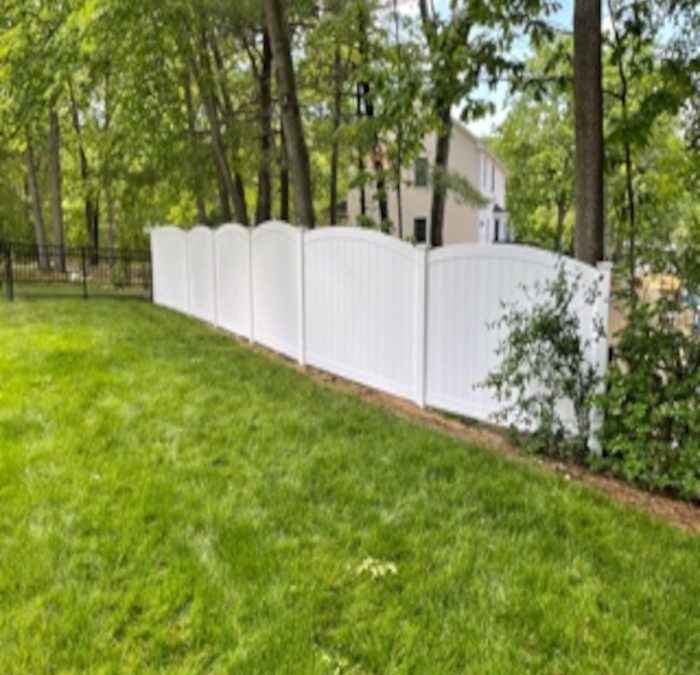 Scalloped White Vinyl Fence installed in Manchester, NH