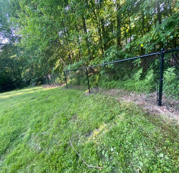 Chain Link and White Vinyl Fencing installed in Merrimack NH