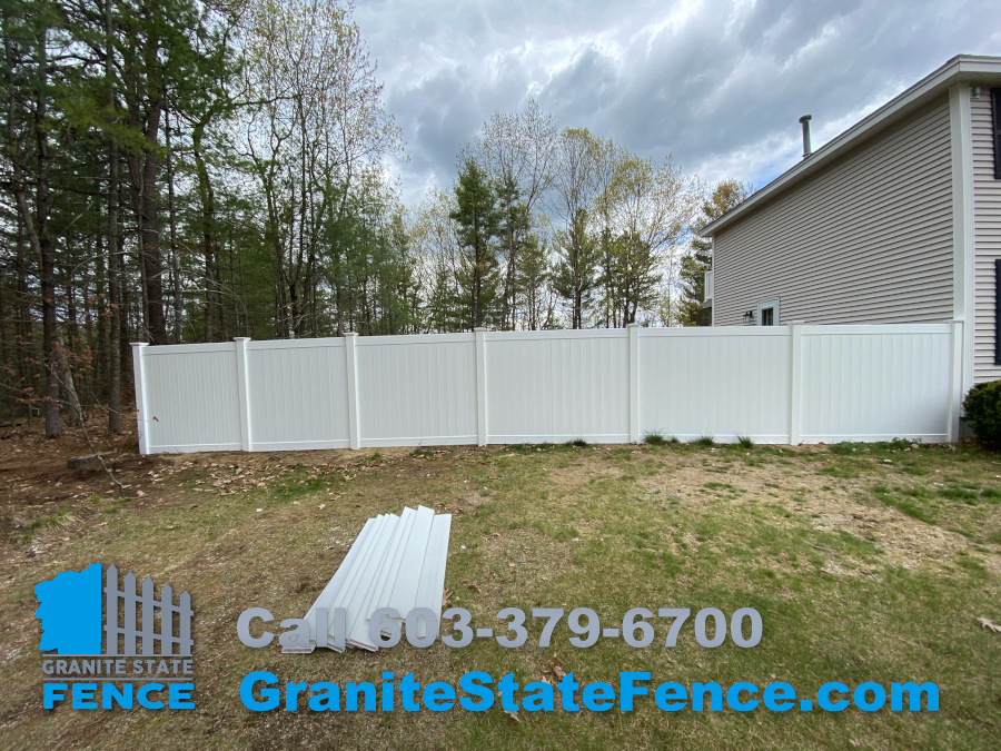 Vinyl Privacy Fence installation in Brookline, NH.