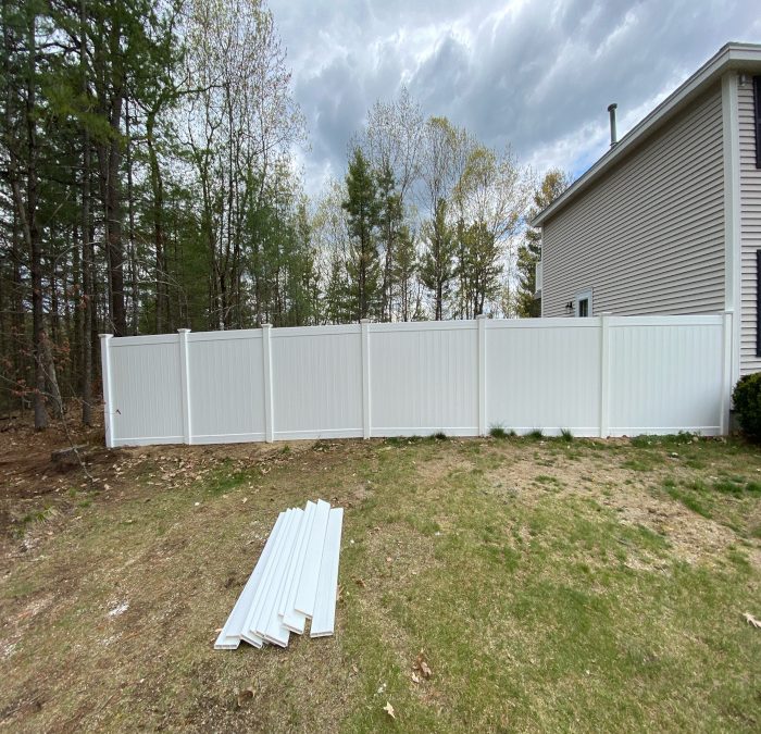 Vinyl Privacy Fence installation in Brookline, NH.