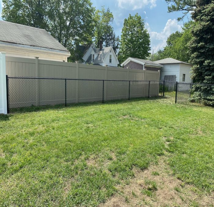 White Vinyl Fencing and Black Chain Link Fencing installed in Manchester NH