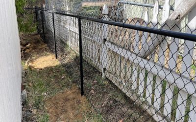 Black Chain Link Fence installation in Merrimack, NH.