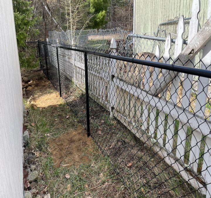 Black Chain Link Fence installation in Merrimack, NH.