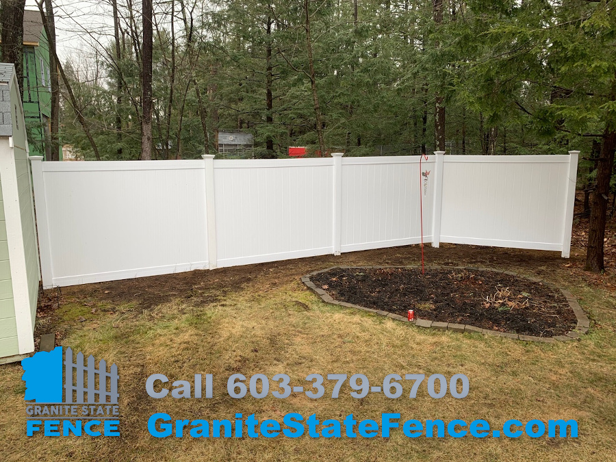 White Vinyl Privacy Fencing for a backyard in Litchfield, NH
