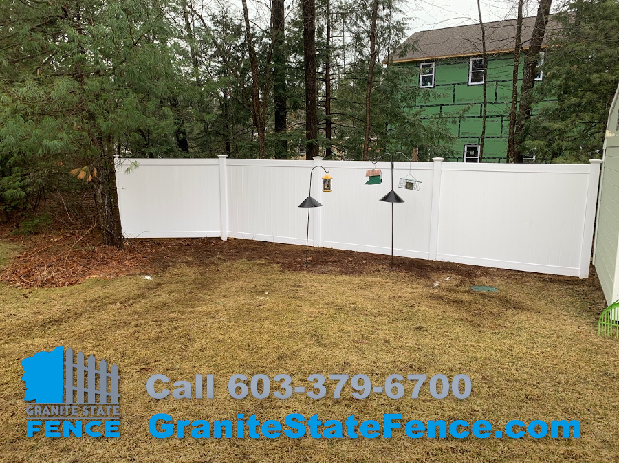 White Vinyl Privacy Fencing for a backyard in Litchfield, NH