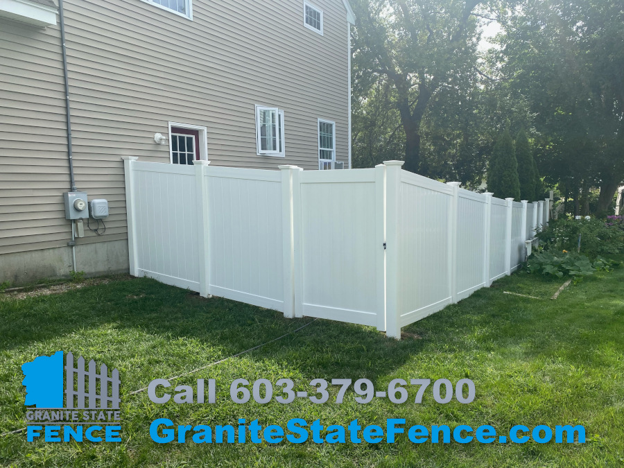 White Vinyl Privacy Fence installed in Derry, NH.