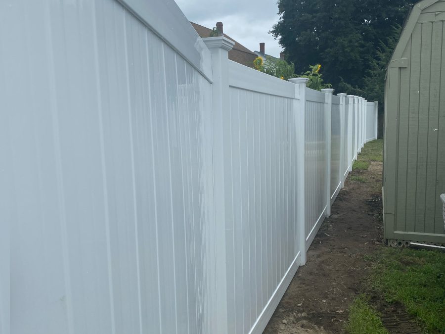 Vinyl Fencing installation in Dracut, MA.