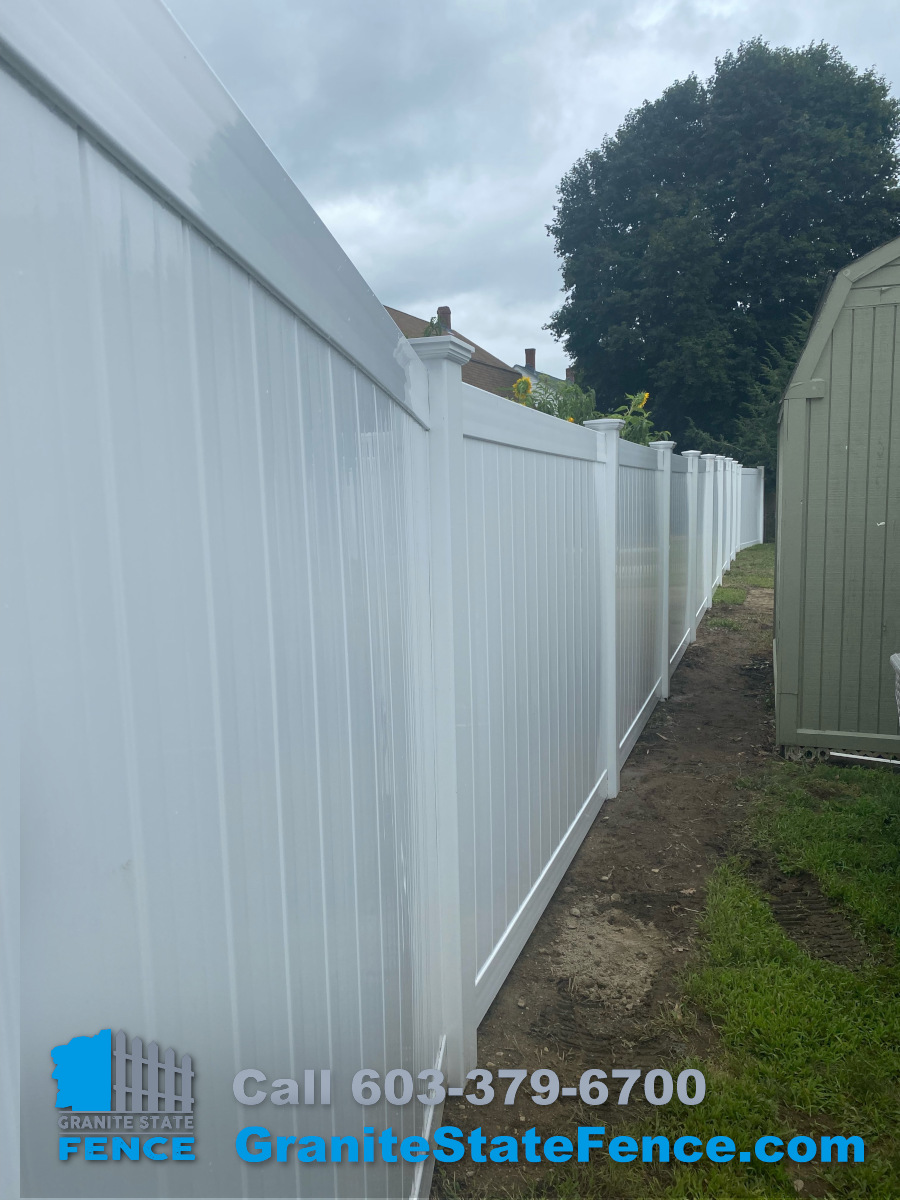Vinyl Fencing installation in Dracut, MA. Granite State Fence