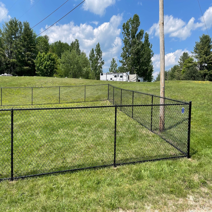 Black Chain Link Fence installed in Newport, NH. | Granite State Fence