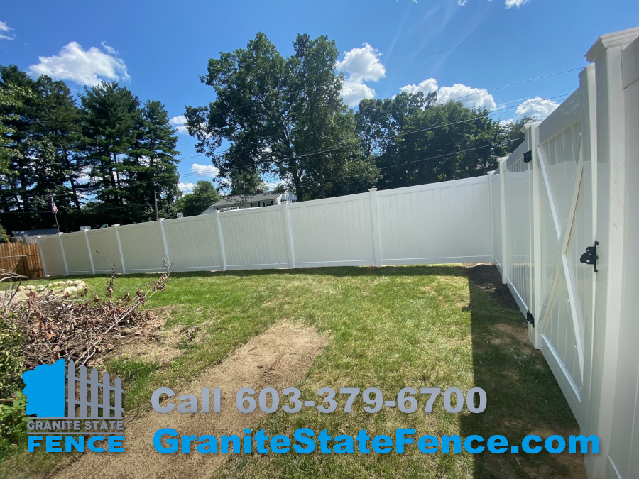 White Vinyl Privacy Fence installed in Nashua, NH.