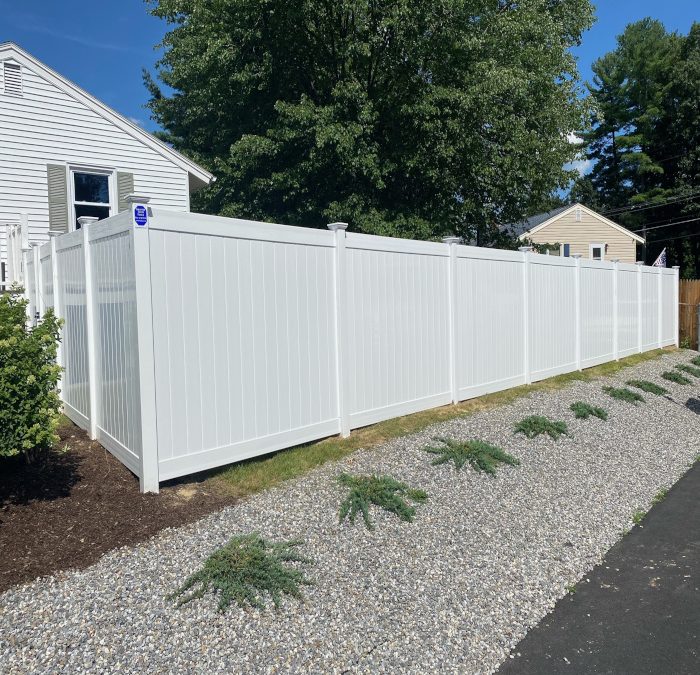 White Vinyl Privacy Fence installed in Nashua, NH.