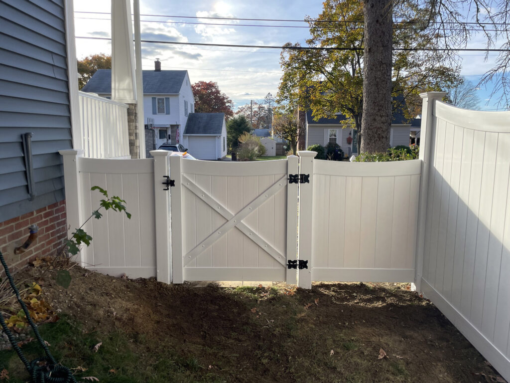 Granite State Fence, Manchester, NH, 4' White Vinyl scalloped privacy Fencing with a 4'w gate (3)