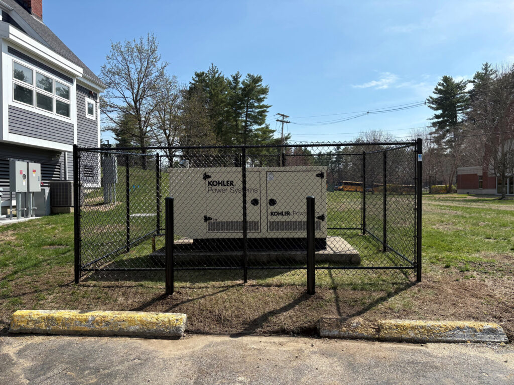 Commercial Chain Link Fence Installation in Townsend, MA. Granite State Fence installed this 6-foot black commercial chain link fence in Townsend, MA, providing secure protection around critical equipment. ⚙️ Equipment Protection: Enclosure built to safeguard generator systems 🔒 Security: Durable 6’ black chain link for long-term reliability 🚪 Access Control: 3’ wide gate for controlled entry 🛠️ Reinforced Build: Bottom rail adds strength and stability 🛑 Safety Features: Two steel bollards installed for added impact protection Designed for commercial applications, this installation delivers a clean, professional look while ensuring safety, accessibility, and long-lasting performance.