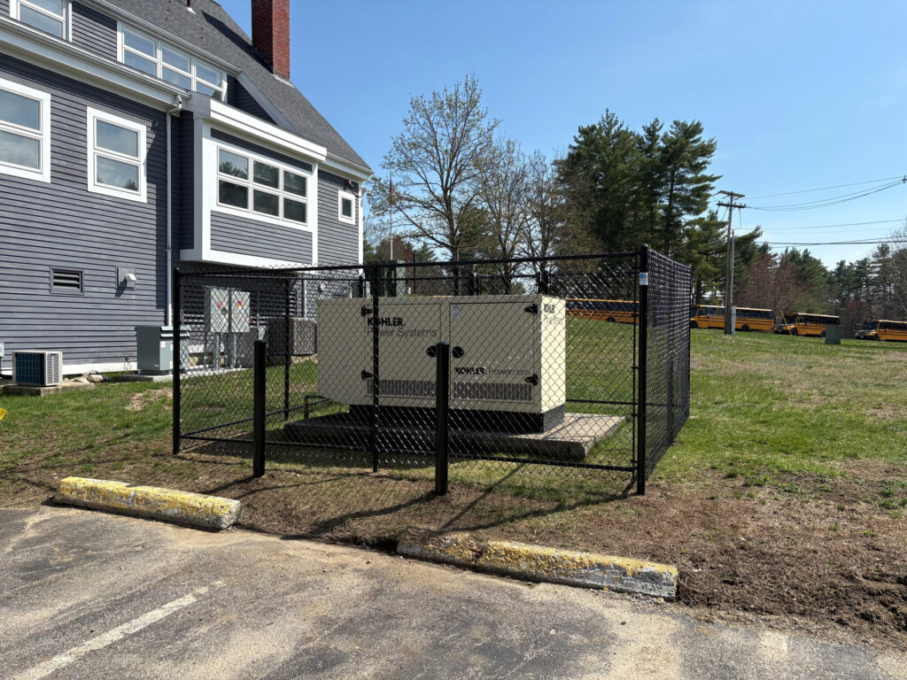 Commercial Chain Link Fence Installation in Townsend, MA. Granite State Fence installed this 6-foot black commercial chain link fence in Townsend, MA, providing secure protection around critical equipment. ⚙️ Equipment Protection: Enclosure built to safeguard generator systems 🔒 Security: Durable 6’ black chain link for long-term reliability 🚪 Access Control: 3’ wide gate for controlled entry 🛠️ Reinforced Build: Bottom rail adds strength and stability 🛑 Safety Features: Two steel bollards installed for added impact protection Designed for commercial applications, this installation delivers a clean, professional look while ensuring safety, accessibility, and long-lasting performance.