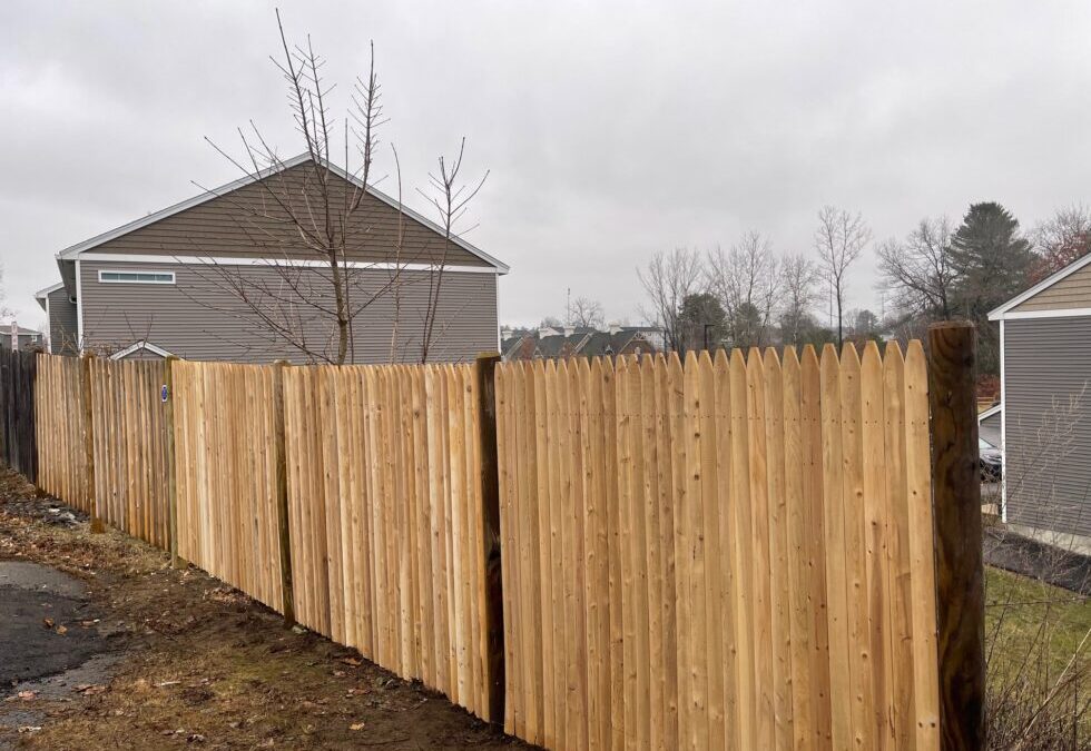 Stockade Wood Fencing installed in Derry, NH.