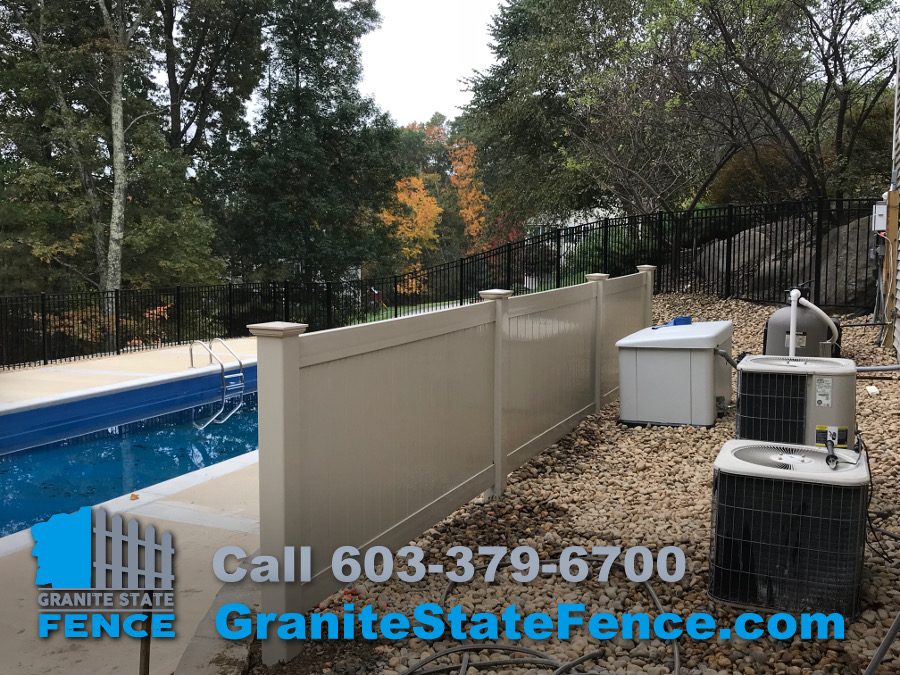 Custom four foot, beige, vinyl fence installation in Windham, NH by Granite State Fence's vinyl fence contractors.