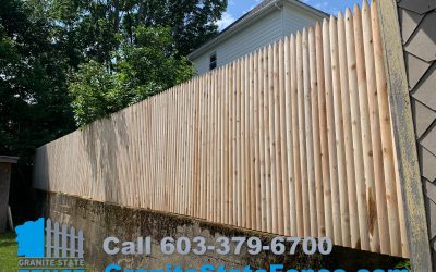 Londonderry Fence Company installs cedar stockade fence in Nashua, NH.