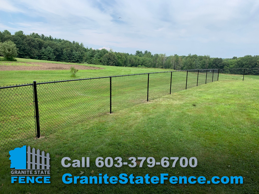 Black Chain Link Fence Installed in Dracut, MA | Granite State Fence