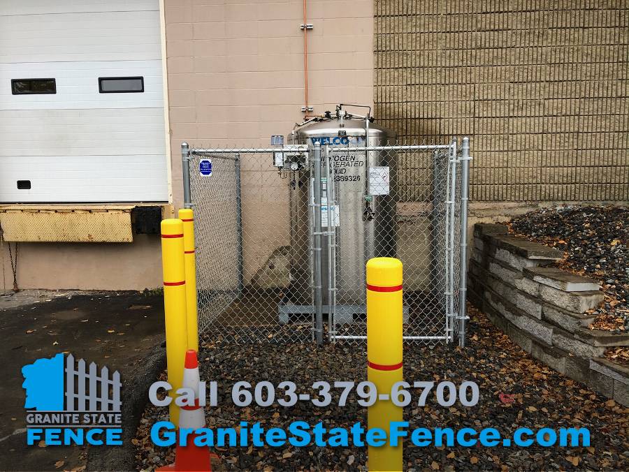galvanized chain link enclosure and 3 bollards around the tank for safety.