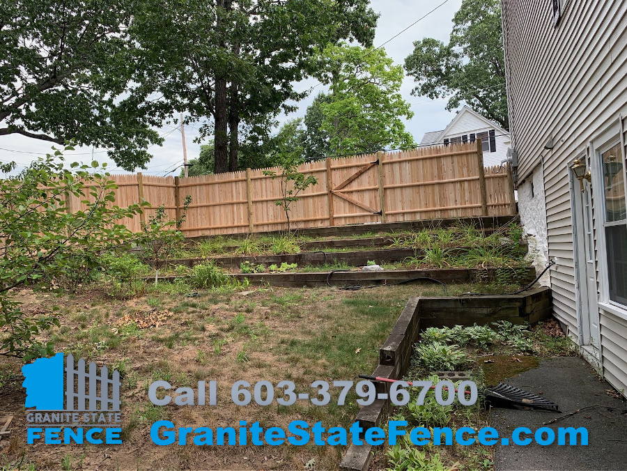 Cedar Stockade Fence installed in Chelmsford, MA.