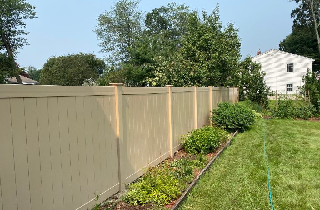 Beige Vinyl Privacy Fencing installed in Salem, NH