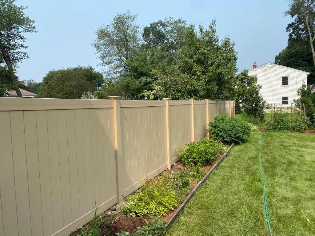Beige Vinyl Privacy Fencing installed in Salem, NH