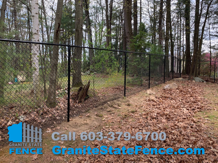 6' Black Chain Link fence installed for doggie play area in Nashua, NH.