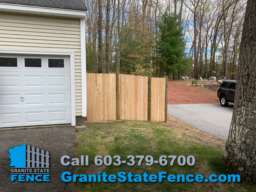 Cedar Panel Fence with Round Posts installed in Nashua, NH.