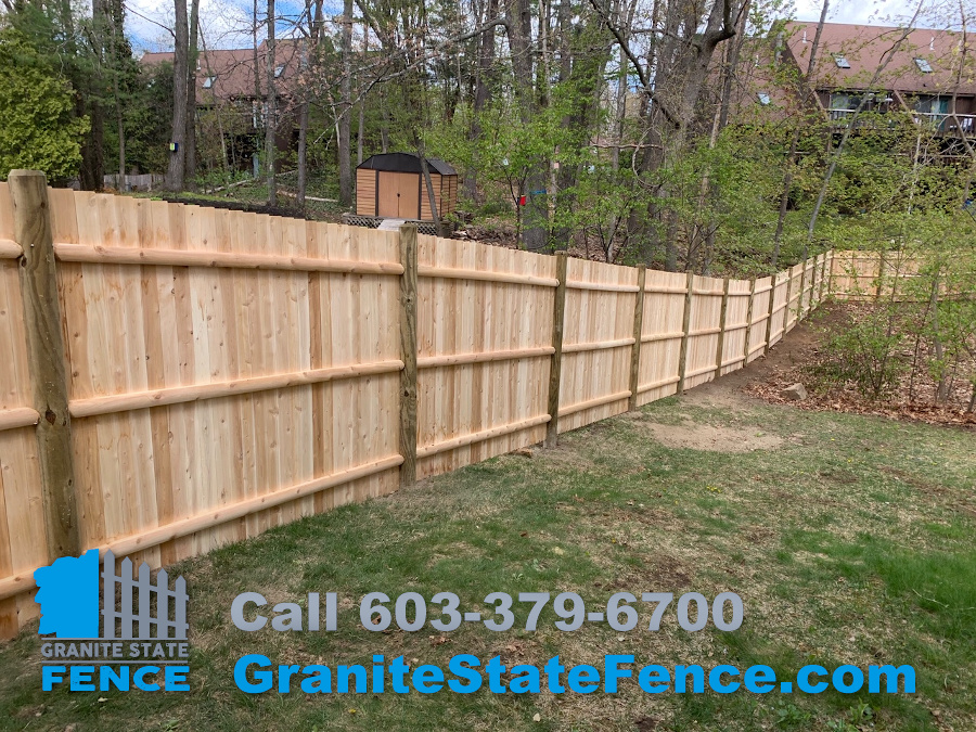 Cedar Panel Fence with Round Posts installed in Nashua, NH.