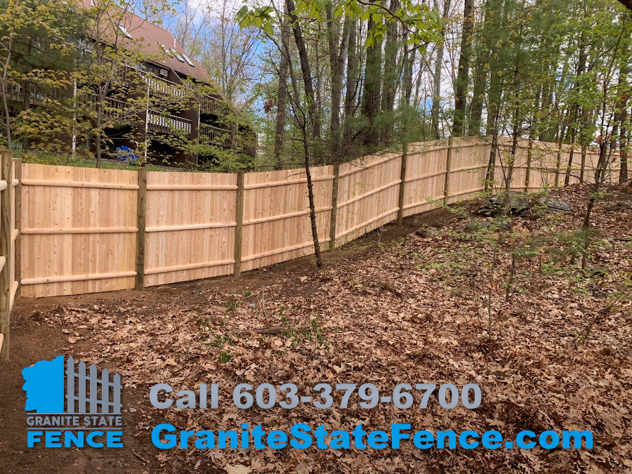 Cedar Panel Fence with Round Posts installed in Nashua, NH.