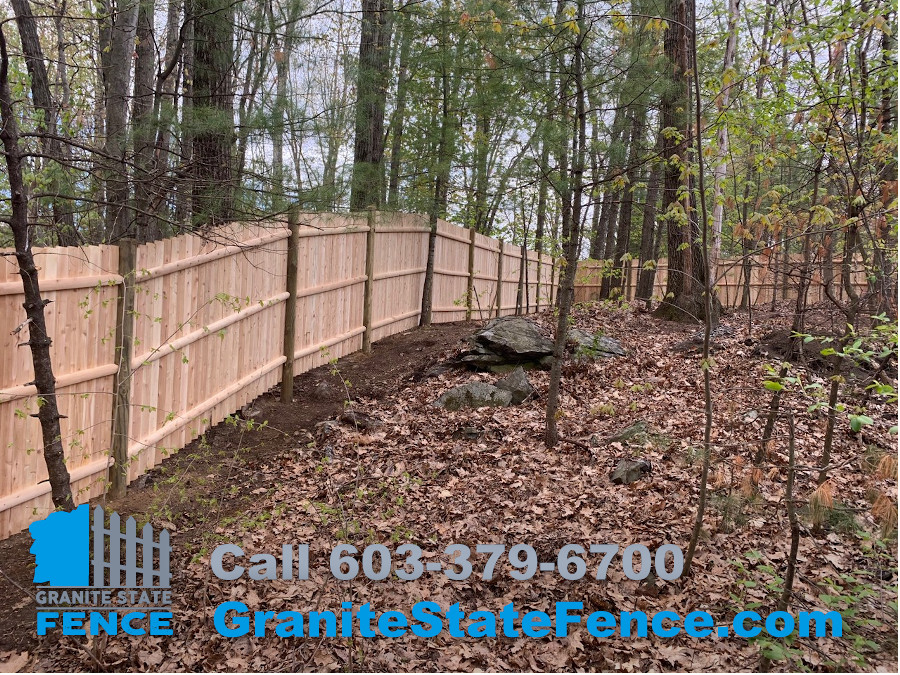 Cedar Panel Fence with Round Posts installed in Nashua, NH.