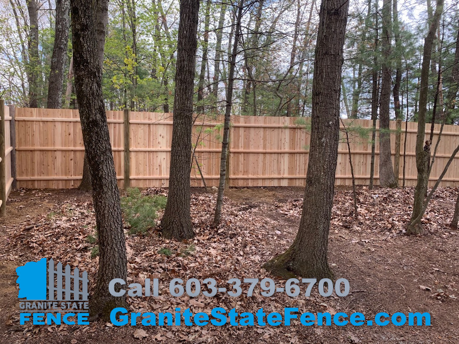 Cedar Panel Fence with Round Posts installed in Nashua, NH.