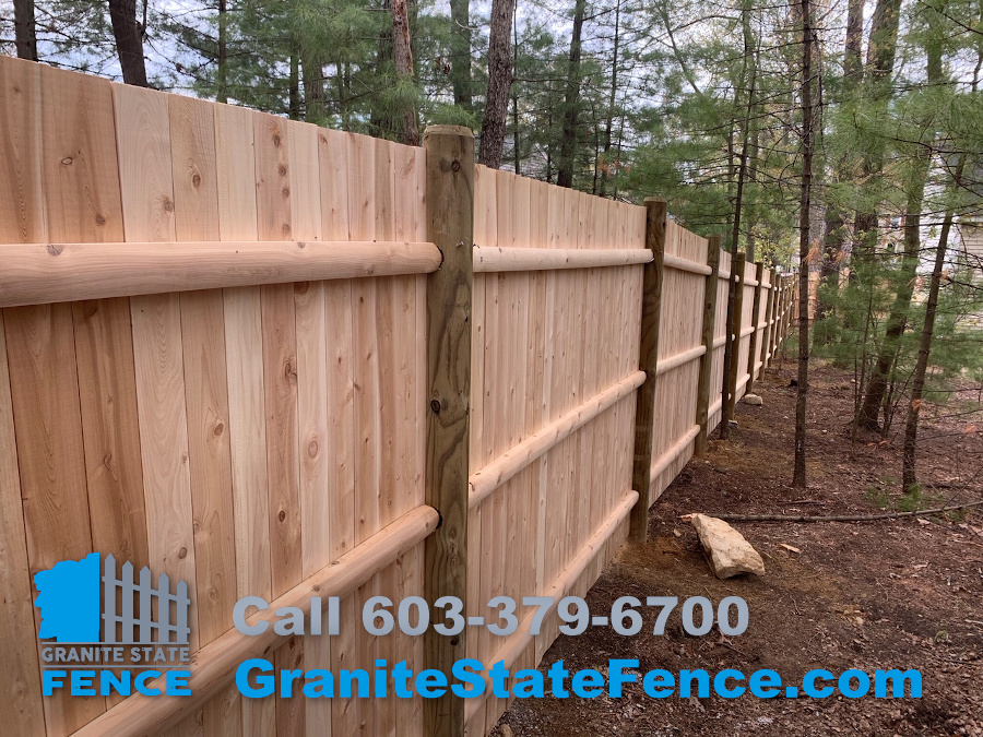 Cedar Panel Fence with Round Posts installed in Nashua, NH.