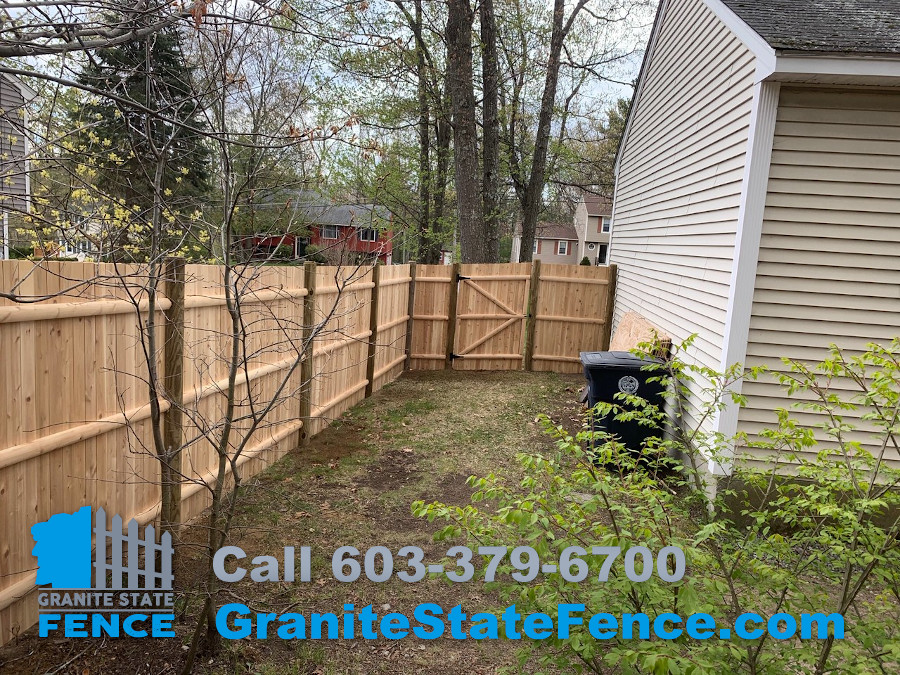 Cedar Panel Fence with Round Posts installed in Nashua, NH.