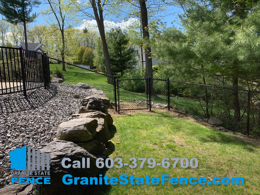 Chain Link fence combined with 2 rail aluminum fencing in Nashua NH