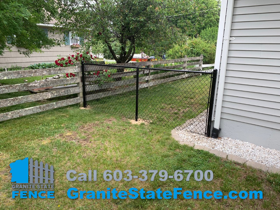 Black Chain Link fence installed in Nashua, NH.