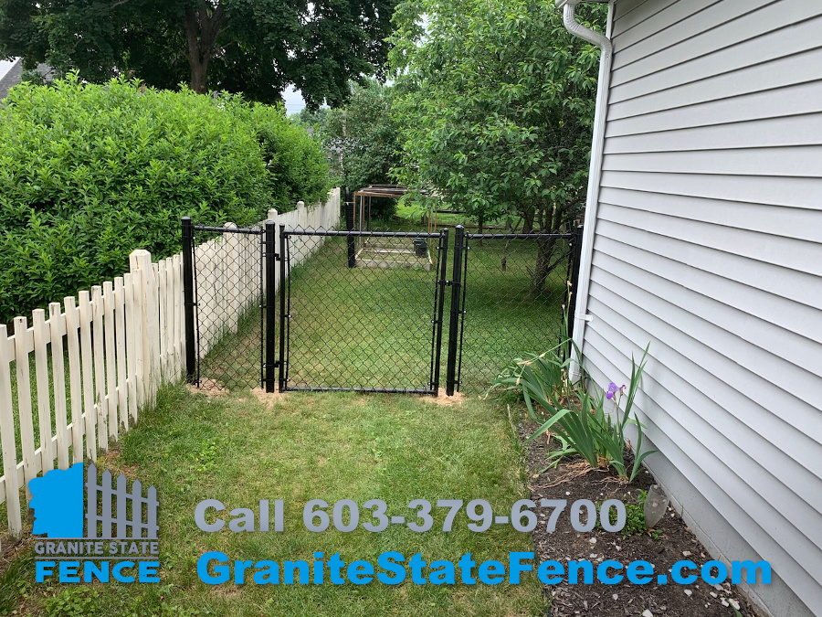 Black Chain Link fence installed in Nashua, NH.