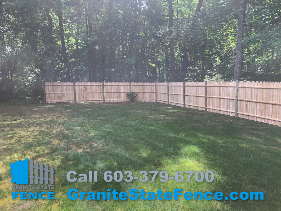 Cedar Stockade Fence installation in Londonderry, NH.