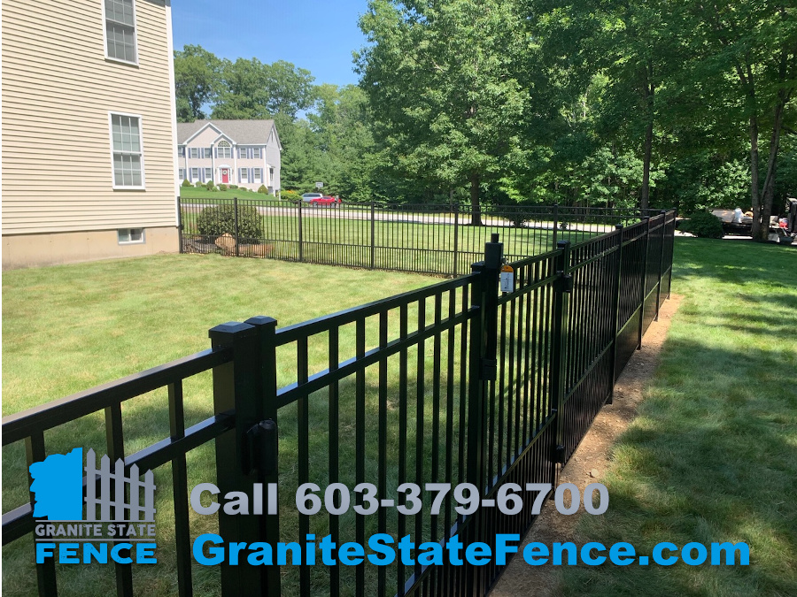 Aluminum Fence with Puppy Picket Barrier installed in Kingston, NH.